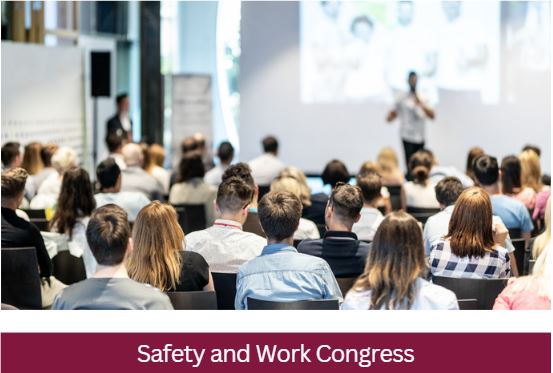 Peoeple sitting in conference to represent work safety congress