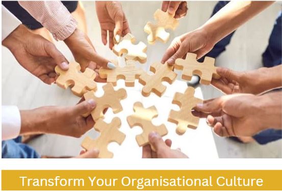 business culture employees all holding a puzzle piece